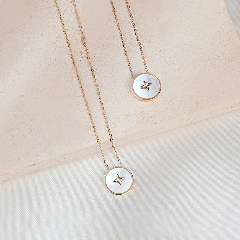 18K金及玫瑰金星芒母貝項鍊近拍照